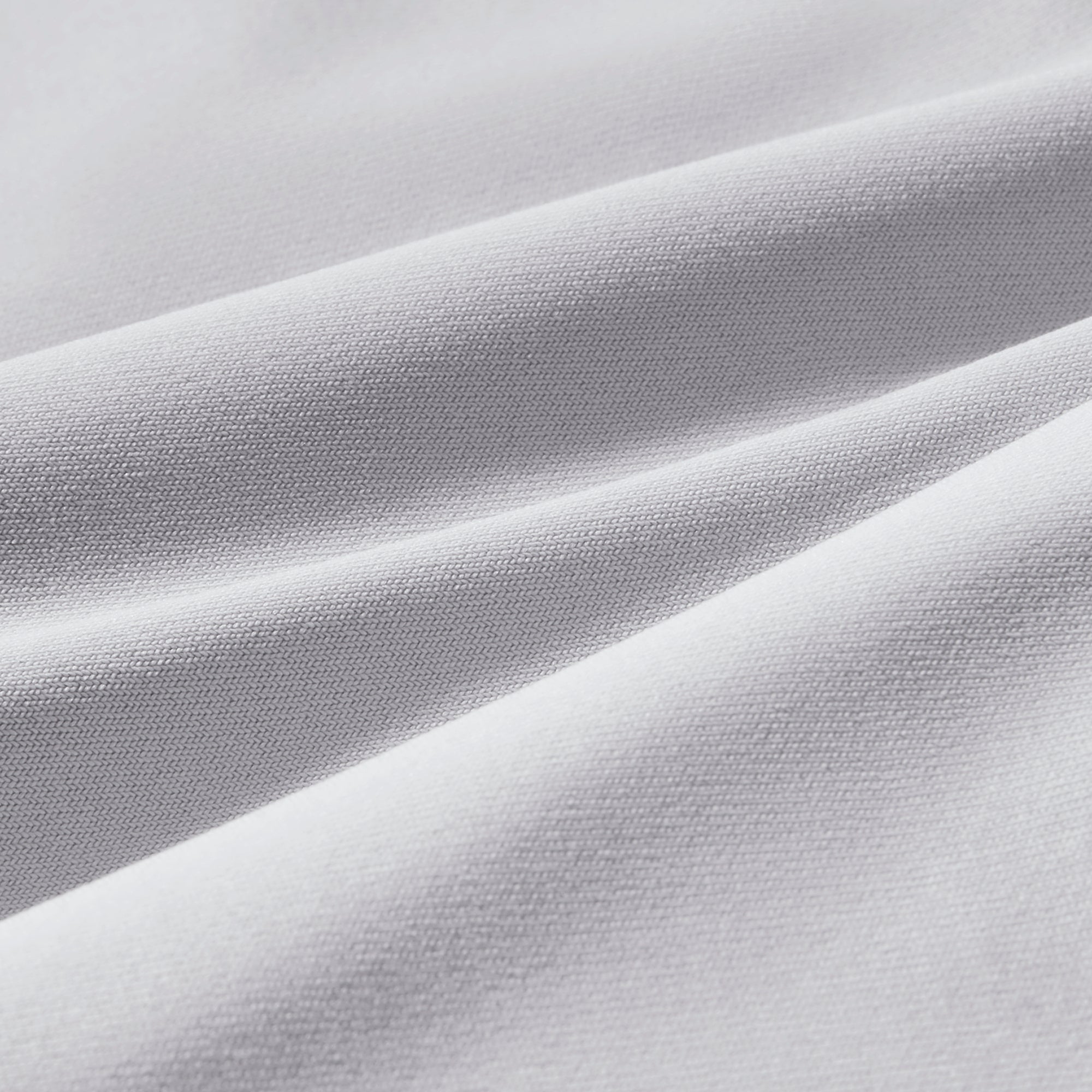 Close-up of white fabric with folds