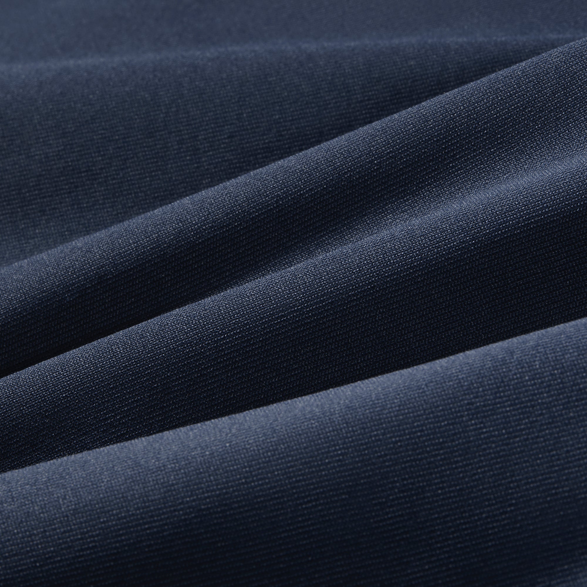 Close-up of dark blue fabric with folds