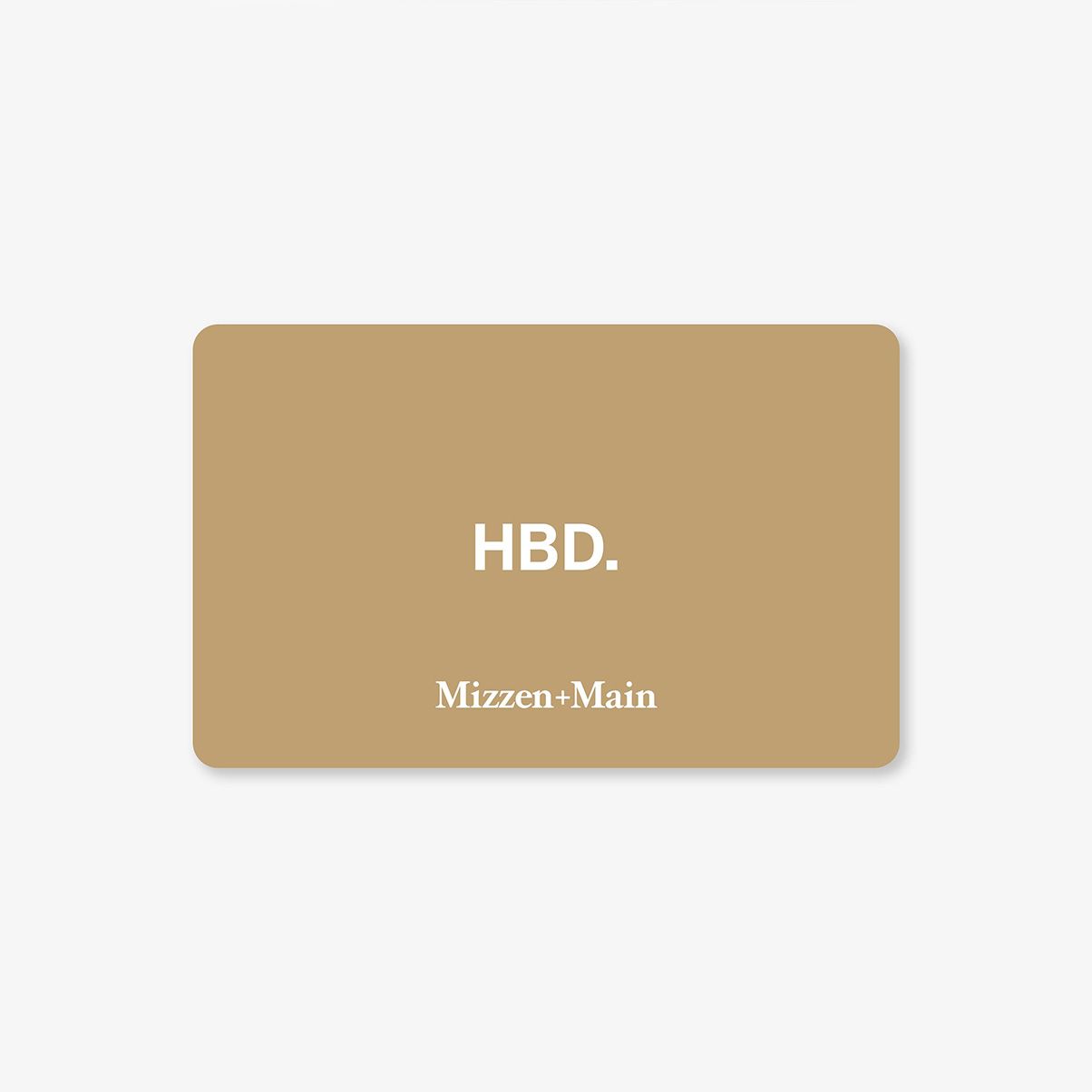 Brown gift card with 'HBD.' and 'Mizzen+Main' text on a white background