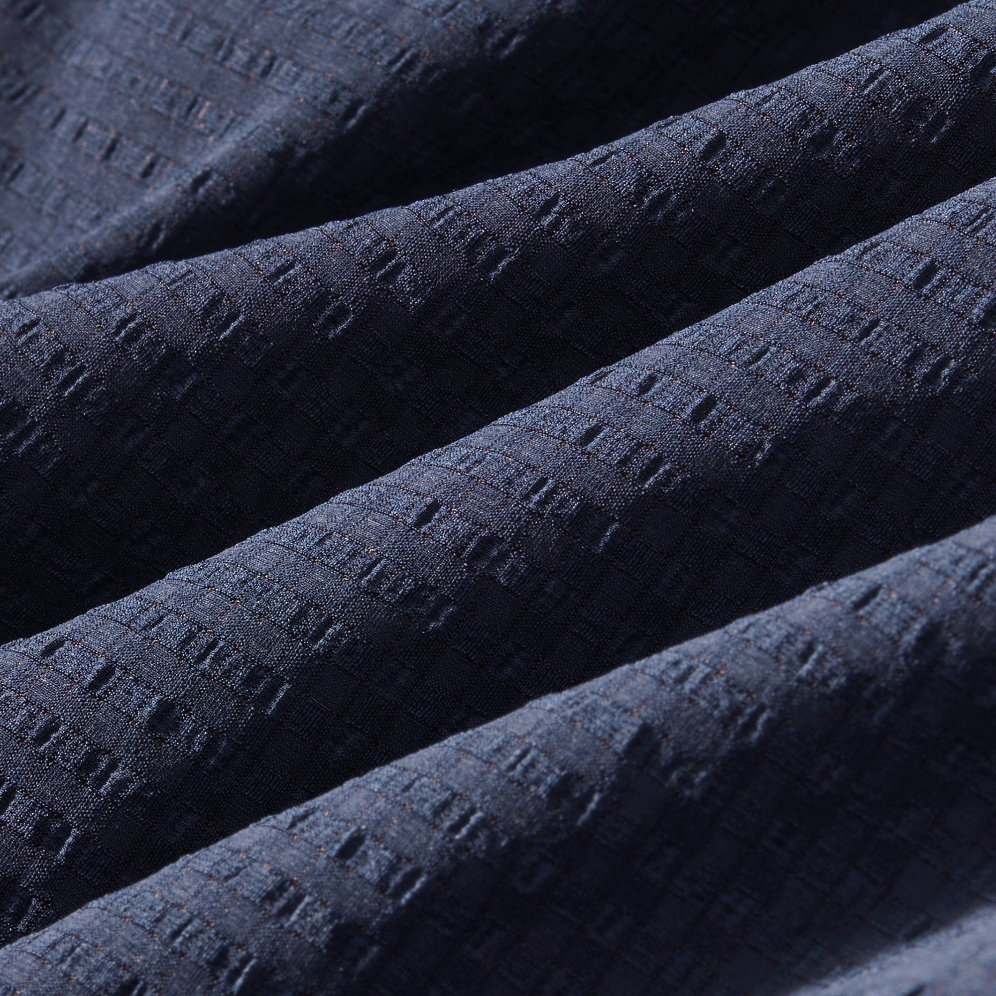 Close-up of dark blue textured fabric