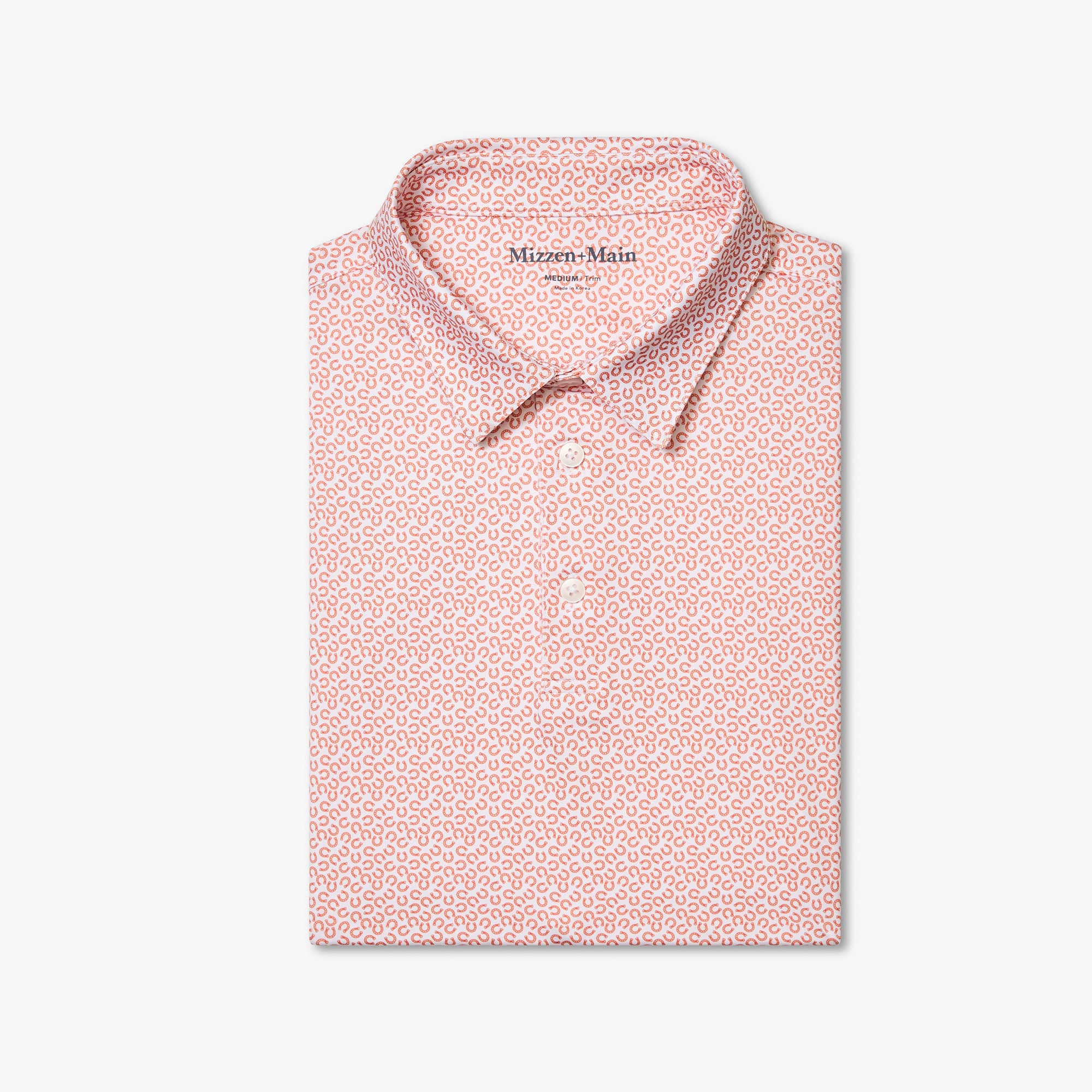 Versa Polo - Burnt Orange Lucky Toss